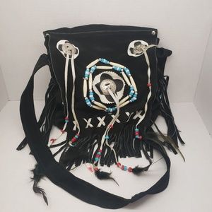 Black leather and feather purse